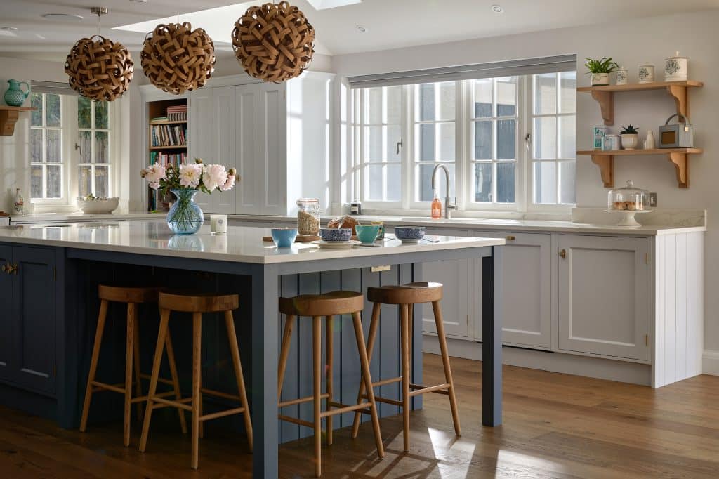 Luxury handmade bespoke shaker kitchen in Tunbridge Wells with hand painted kitchen island and seating.