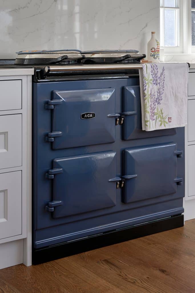 Blue Aga range cooker in grey painted shaker kitchen