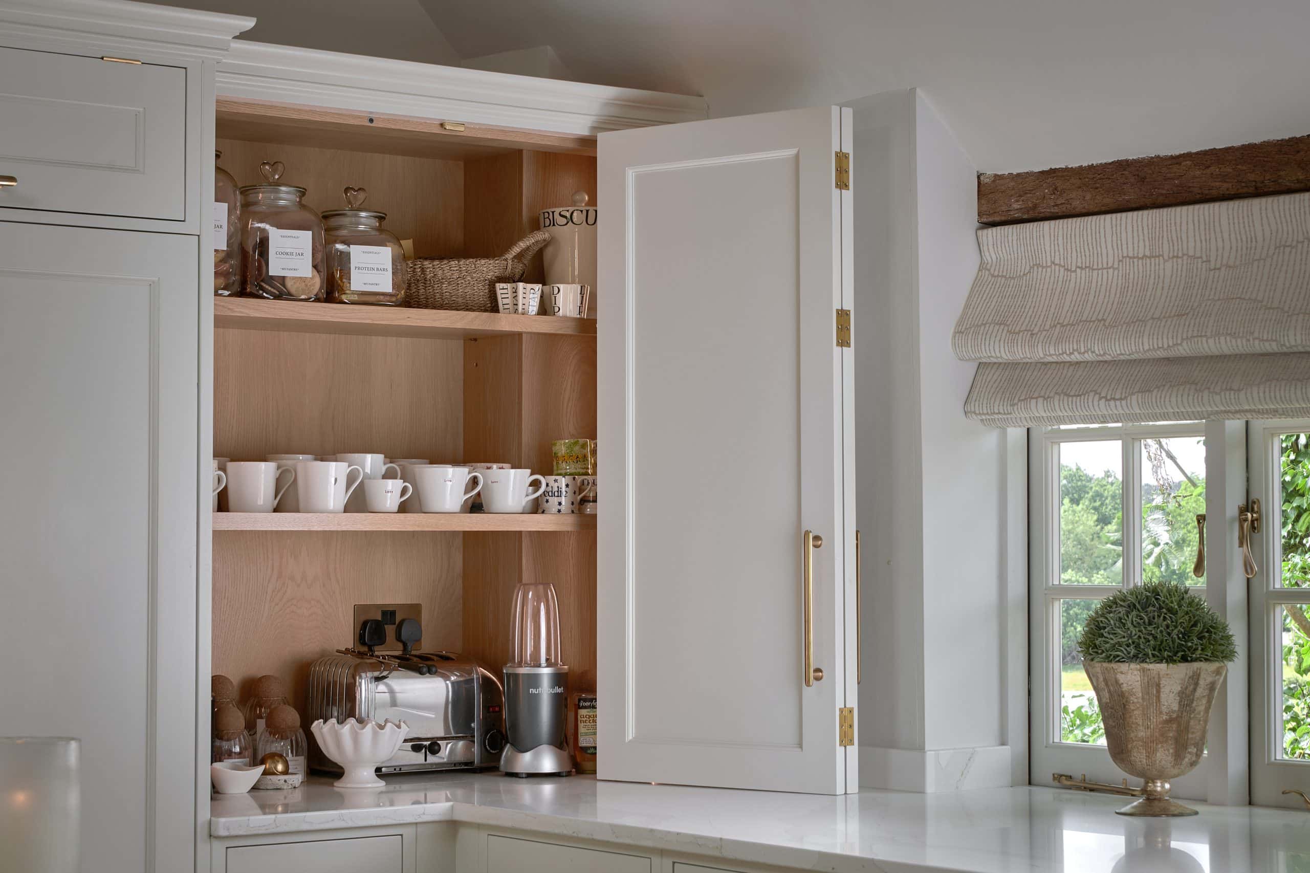 White handmade luxury bespoke Shaker kitchen with breakfast pantry in Kent