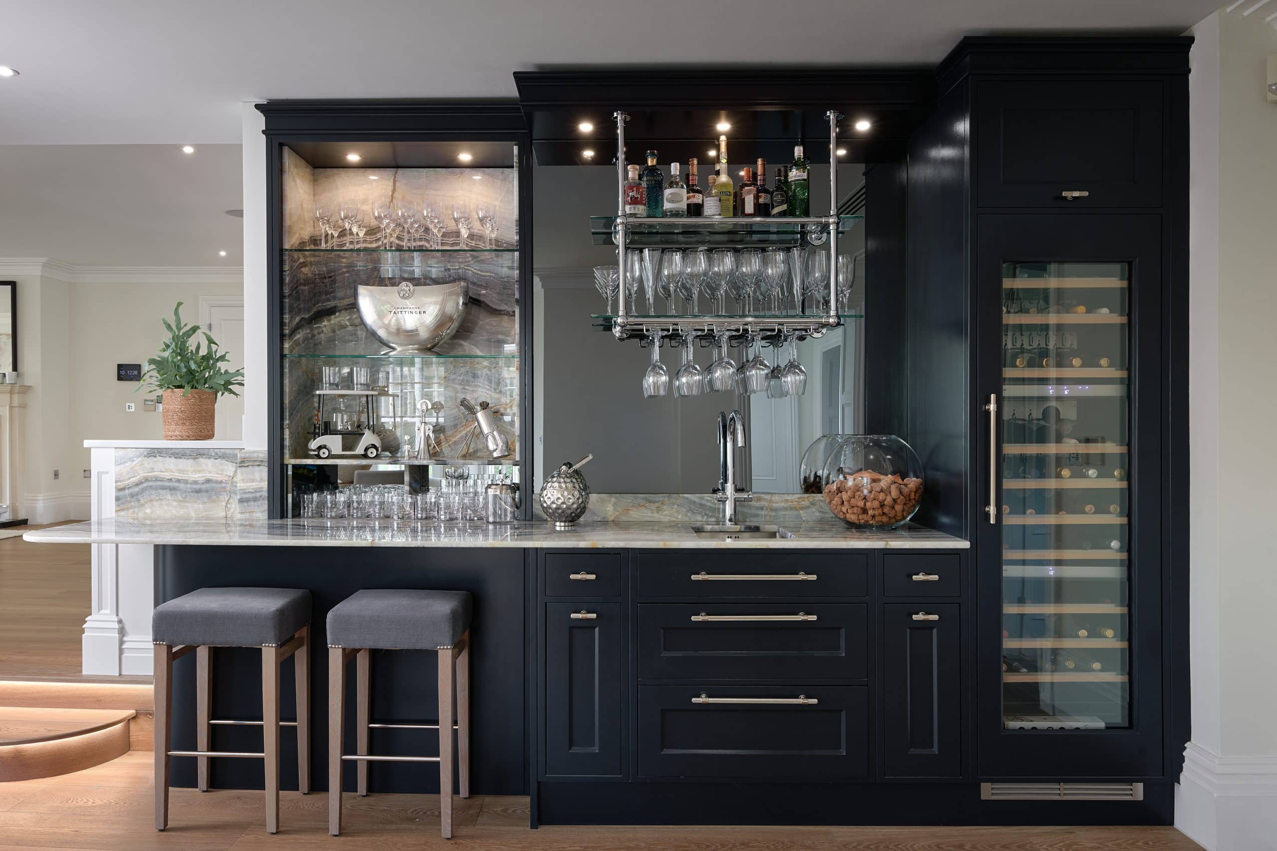 Bespoke cocktail bar with handmade cabinetry and hand-painted finish.